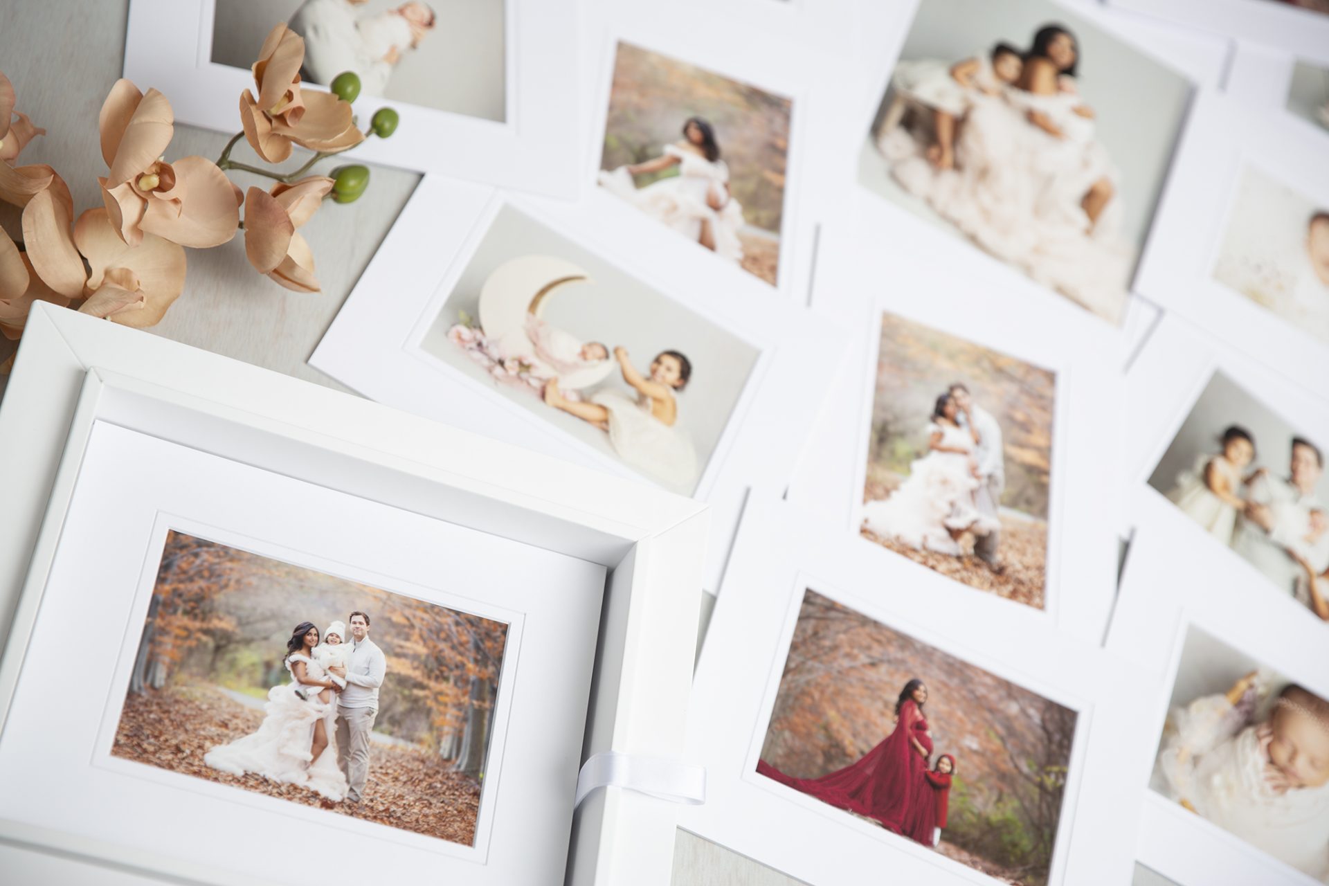 custom artwork fine art prints from a maternity session in white reveal box