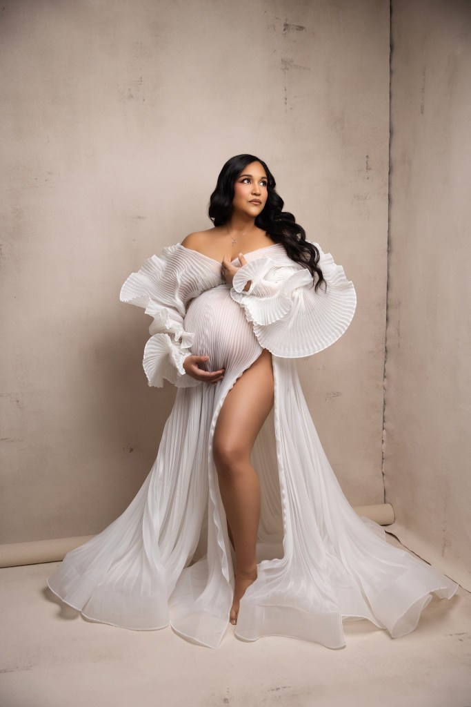 white pleated maternity gown