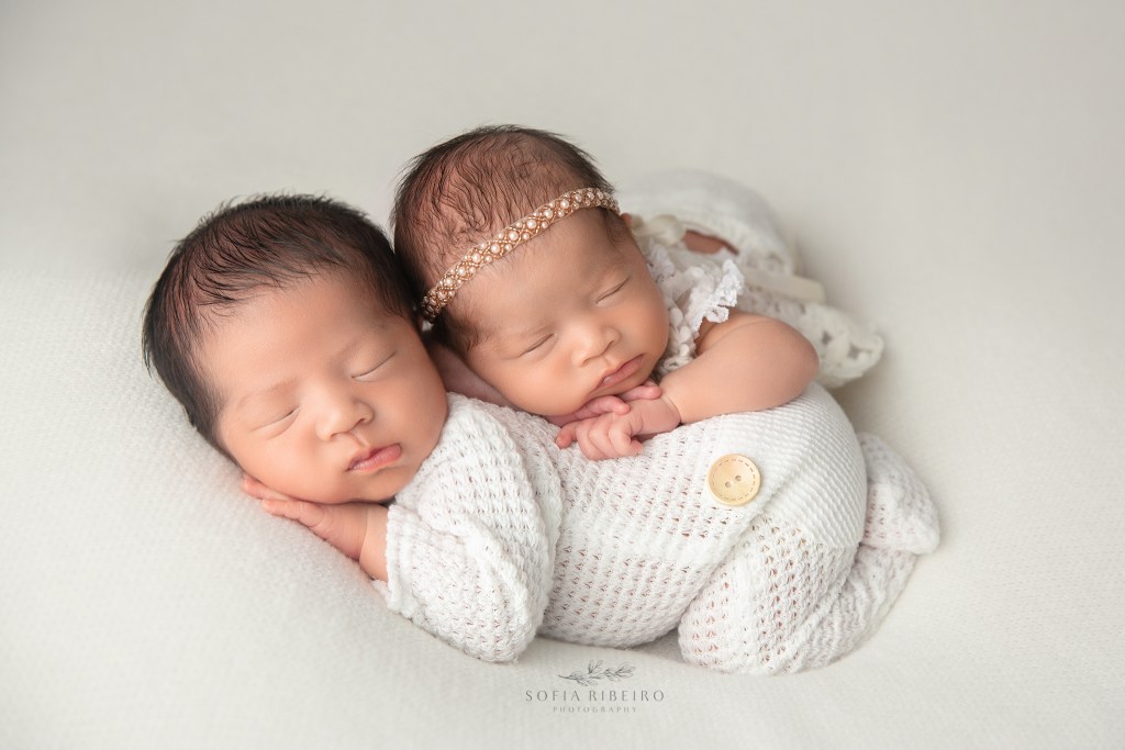 twin babies on white backdrop, are newborn photos worth it