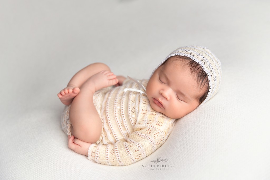 new jersey newborn photographer, baby girl in cream outfit