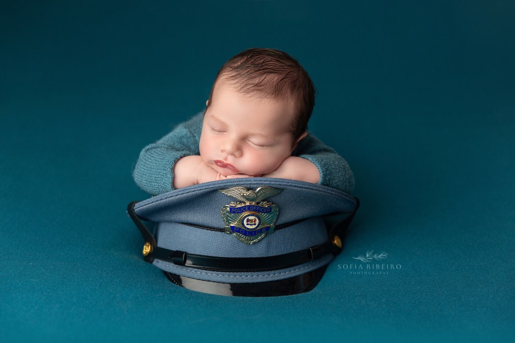 newborn photo baby with police hat