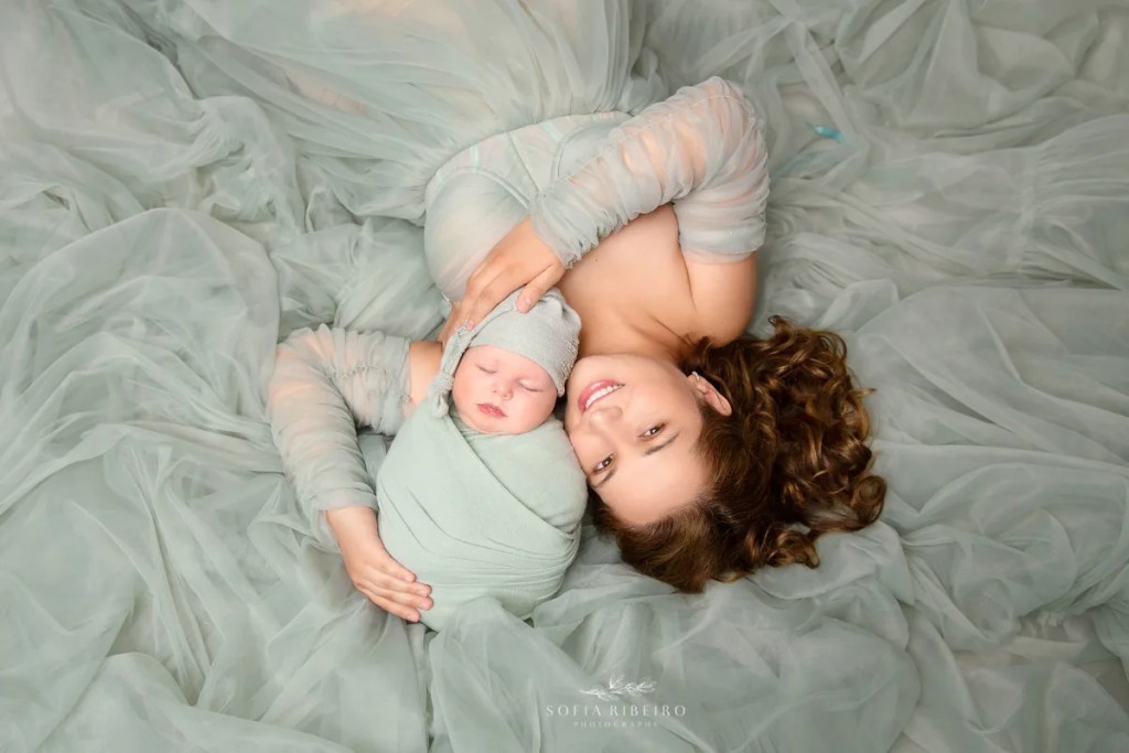 whippany NJ newborn Photographer mom and baby lie down image