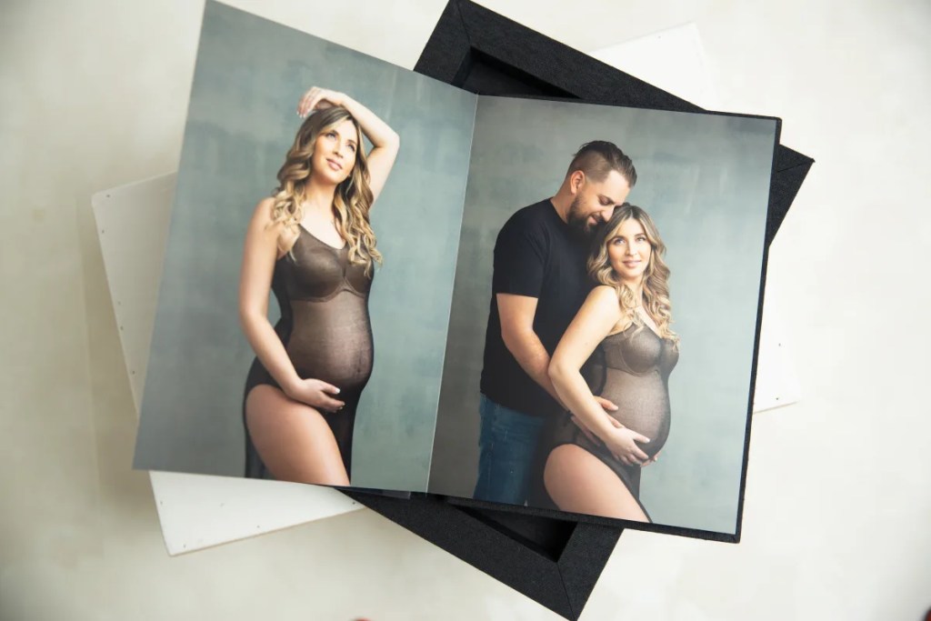 black linen custom photo album from a maternity session