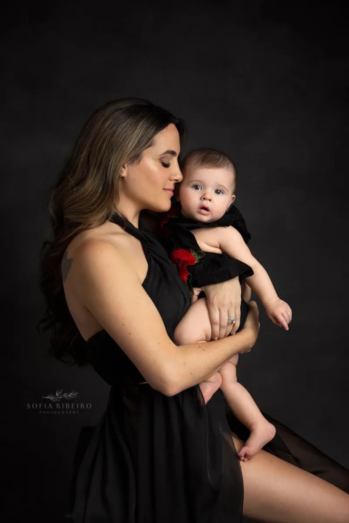 6 month milestone session mom and baby portrait in black