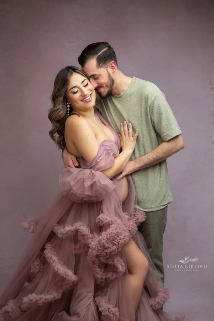 floral maternity session union nj, nj maternity photographer mom and dad in mauve dress