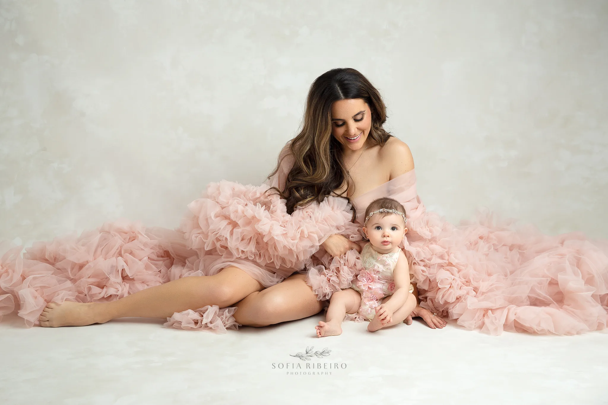 6 month milestone session mom and baby in pink dresses