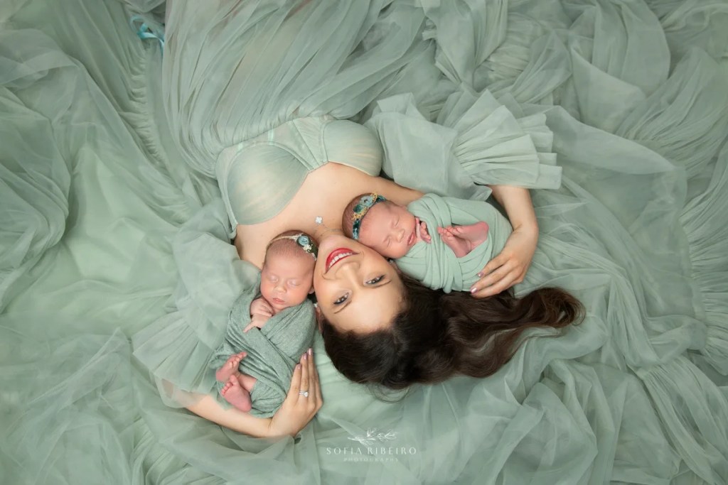 springfield nj newborn photographer, mom and babies laying down in green dress