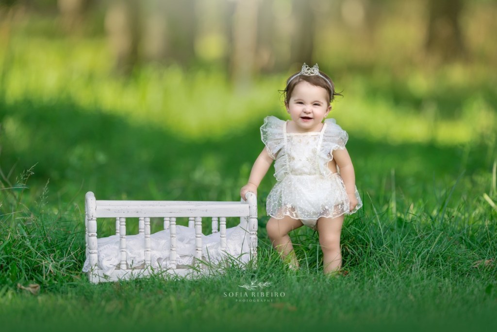1st birthday family session outdoors, baby with crib