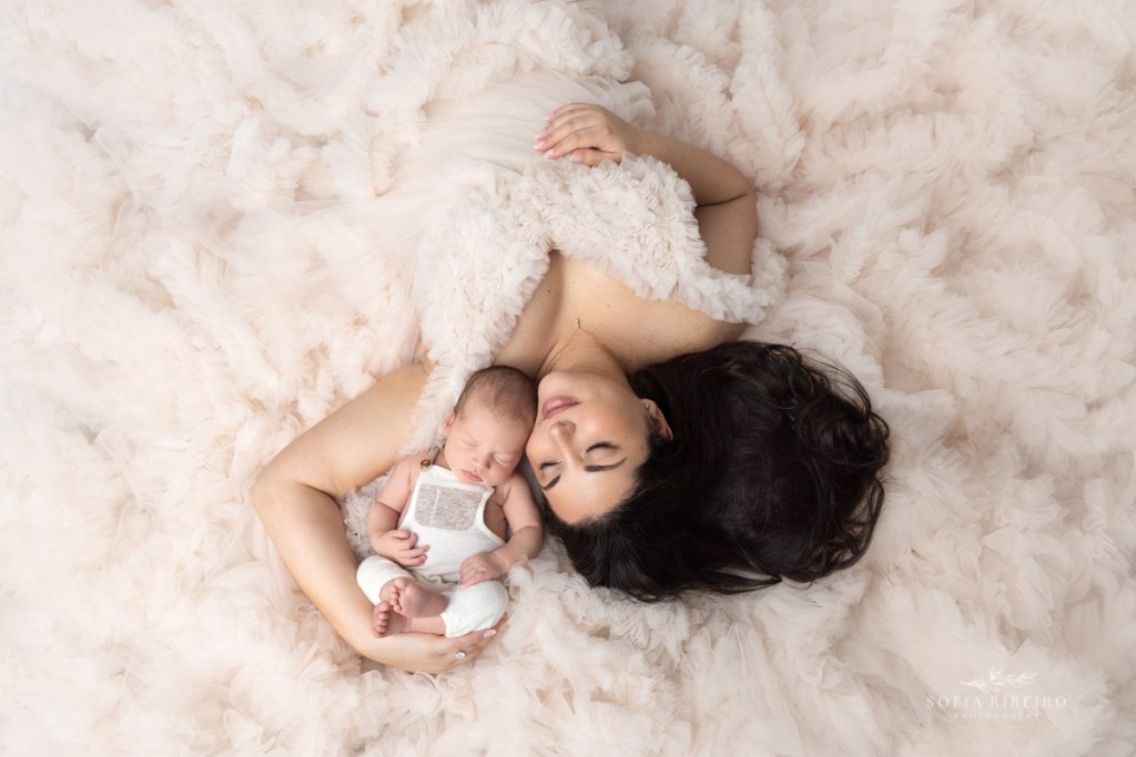 north bergen nj newborn photographer, mom lying down with baby