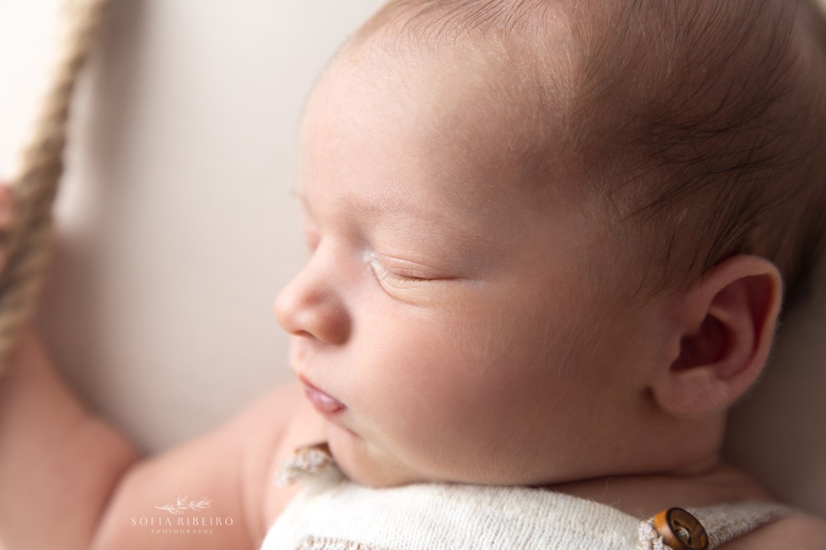  nj newborn photographer takes a closeup of sweet baby cheeks during his newborn portraits