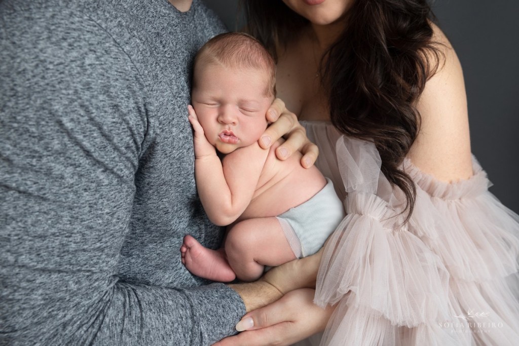 north bergen nj newborn photographer, closeup of baby snuggled with parents