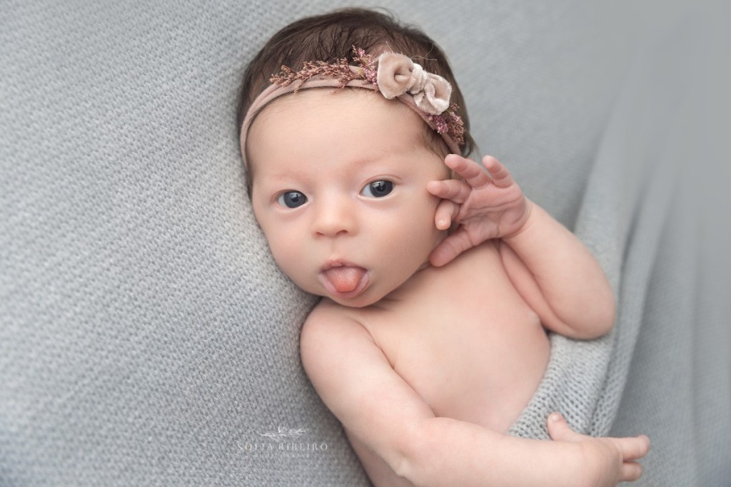 kearny nj newborn photographer, baby sticking her tongue out