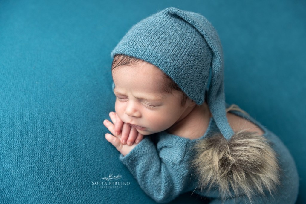 branchburg nj newborn photographer, baby boy in teal blue pajama and backdrop