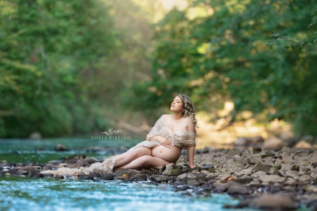 outdoor maternity photography nj, pregnant mother in river wrapped in fabric