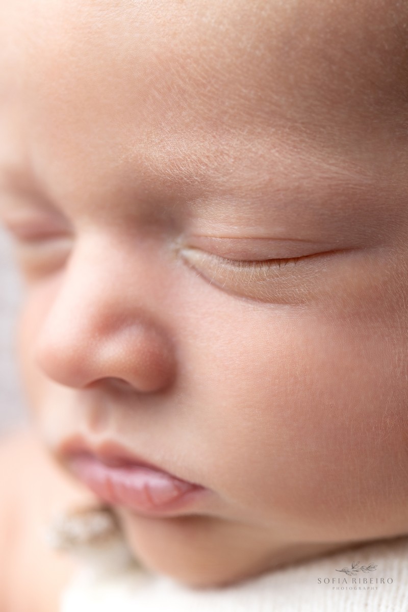 a macro shot showing baby's delicate features