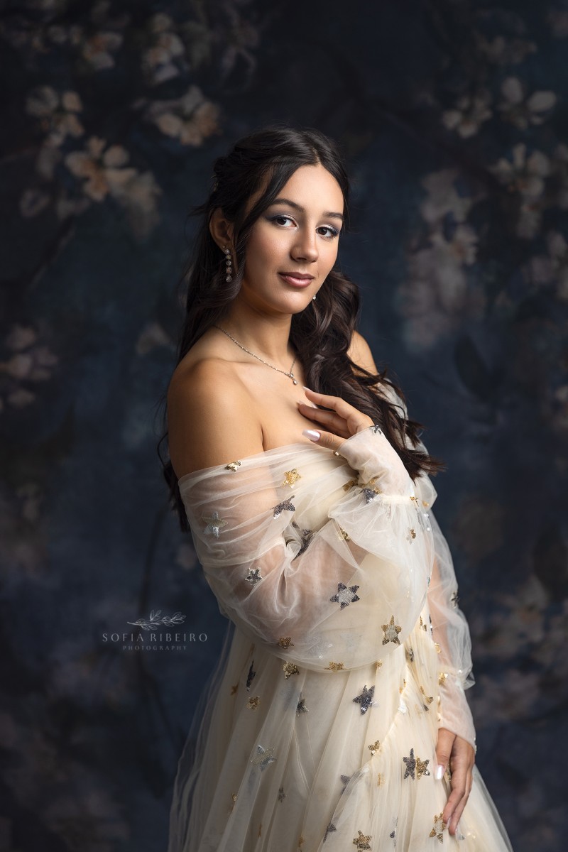 teen poses in a starry tulle dress during a sweet sixteen session with a nj children's photographer