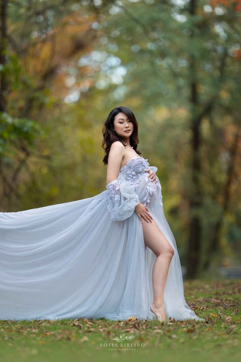 maternity session with mom in a blue dress with dad in a local park in new jersey in the fall