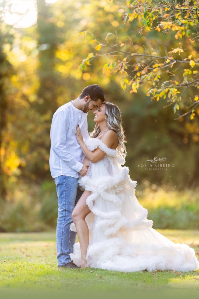 nj outdoor family maternity session, mom and dad together in nj park golden light
