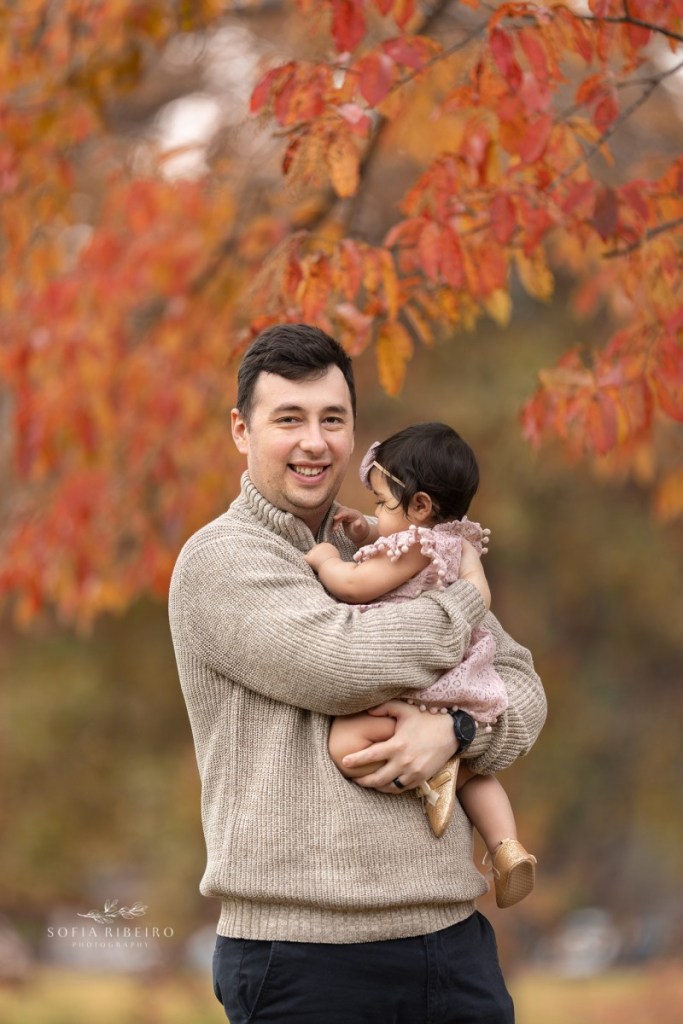 baby with dad during as fall session in nj