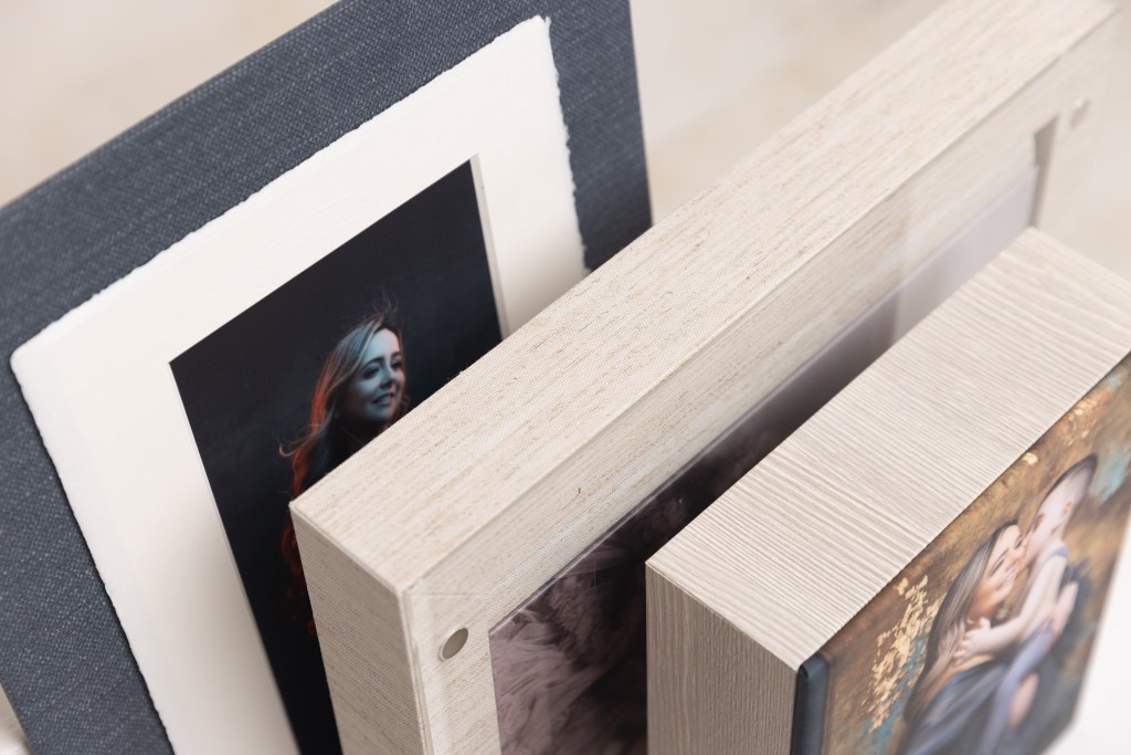 sample wall art and album from clark nj maternity photographer sofia ribeiro