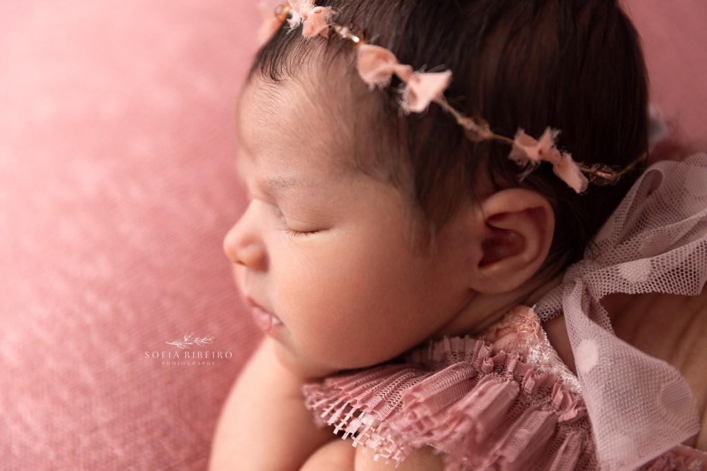 a closeup photo of a newborns delicate features during a session in colonia nj
