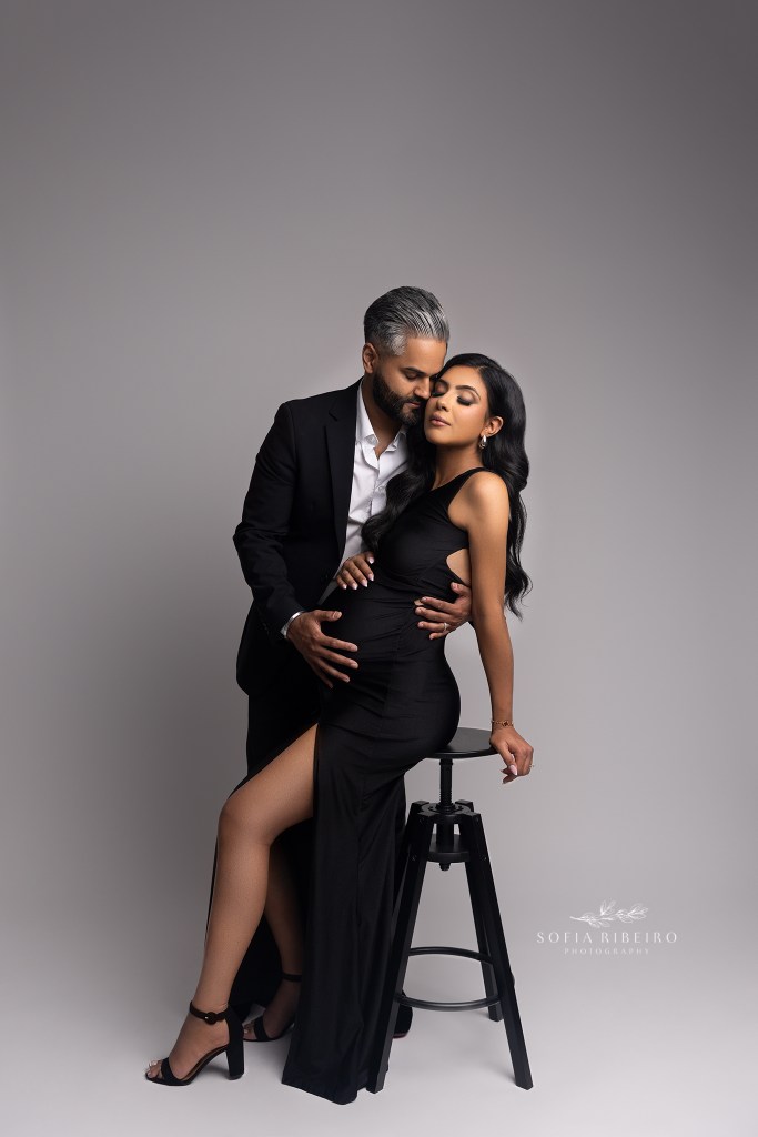 an indian couple poses together during a maternity session in nj