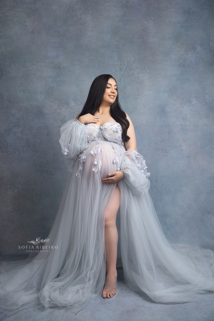 a portrait of a serene, expectant mom