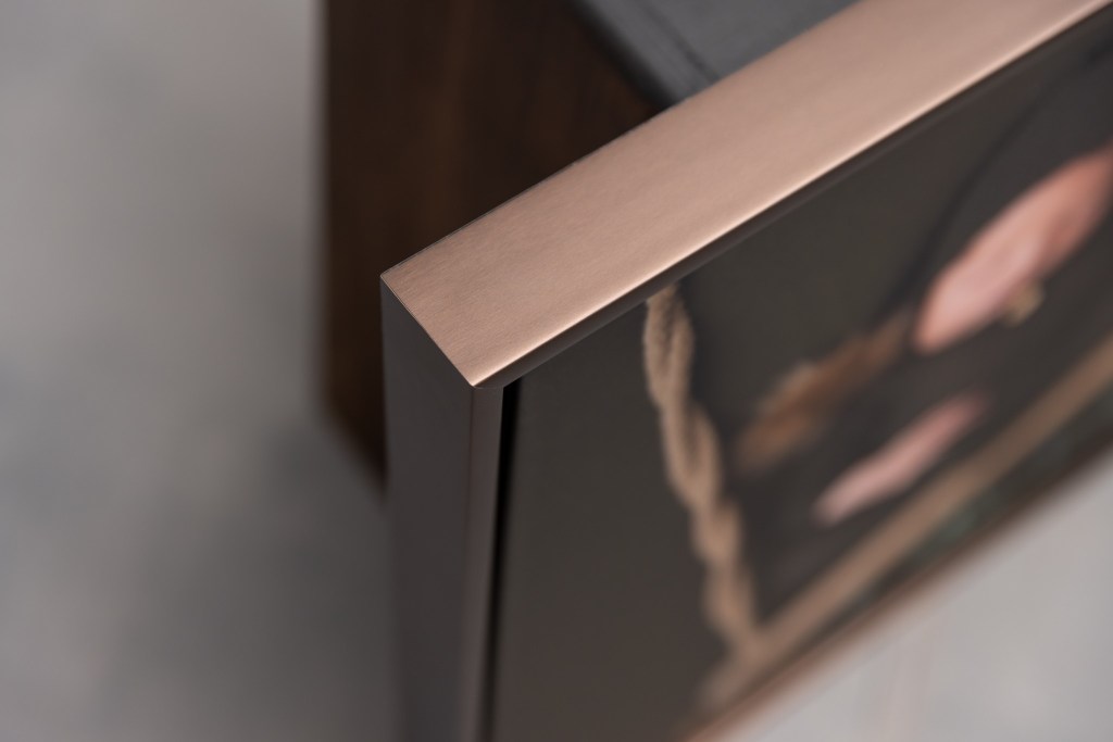 nj newborn photographer showcases floating frame wall art corner