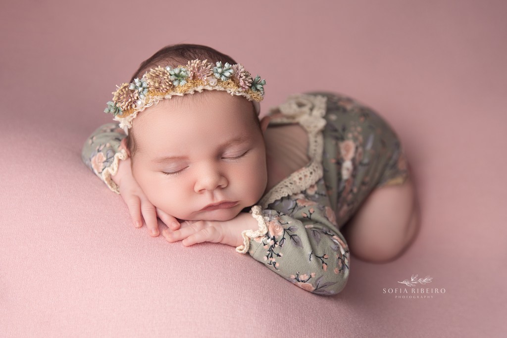 bernards nj newborn photographer captures a baby girl in a sage and pink outfit sweetly sleeping