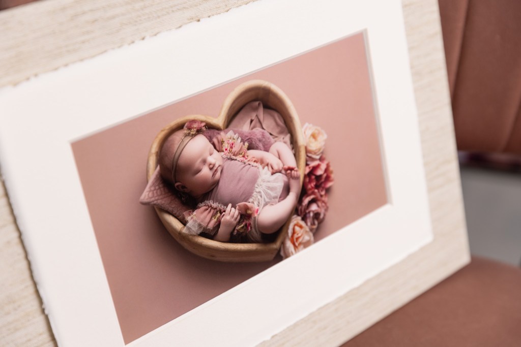 an amalfi panel fine art print showcases a newborn baby's delicate photos