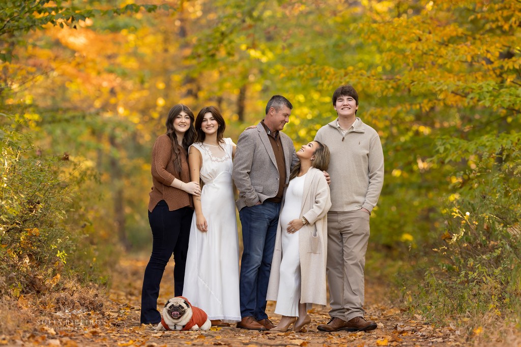 a family of five and their dog pose together on a beautiful fall day in warren, nj
