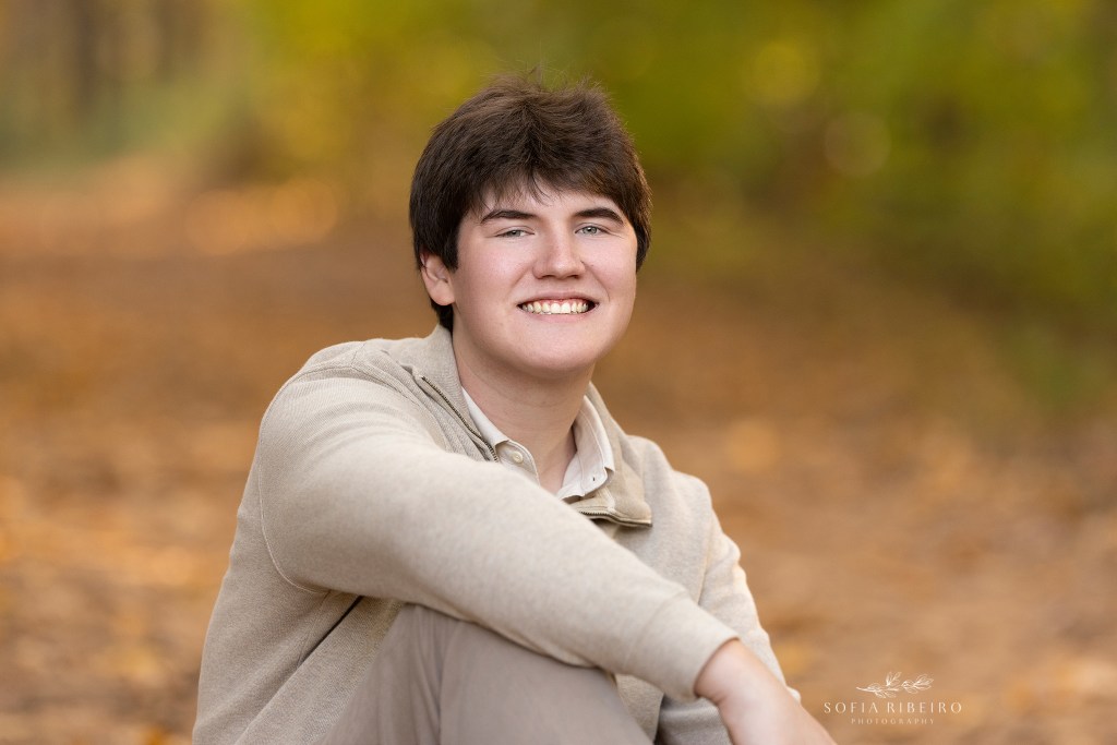 warren nj family photographer captures a portrait of a young adult in the fall.