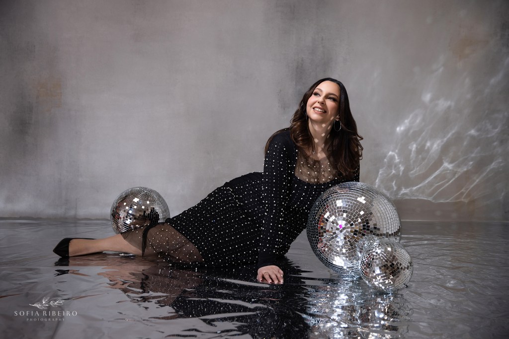 a 30th birthday portrait featuring a beaded dress and disco balls