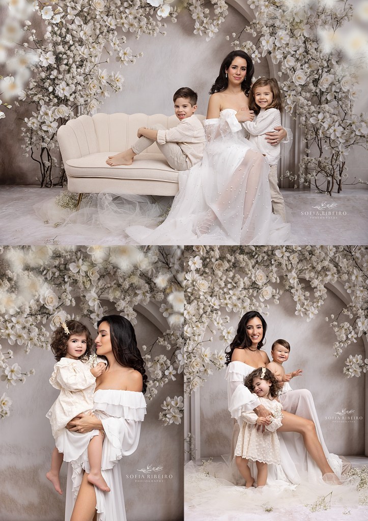 mom poses with her two boys in all creams and white for mommy and me portraits in nj