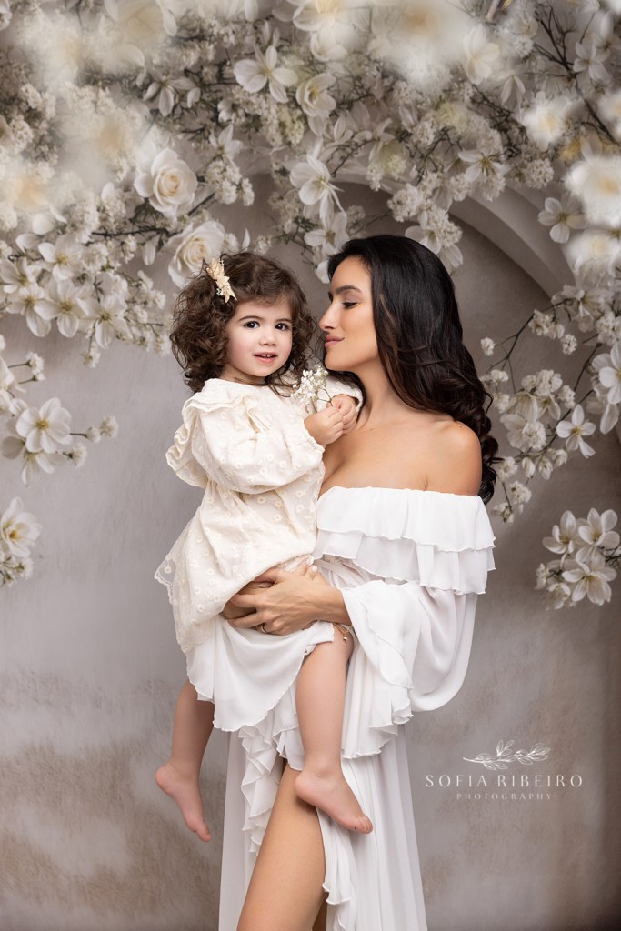 mom looks lovingly at her daughter for mom and me photos in an nj photo studio