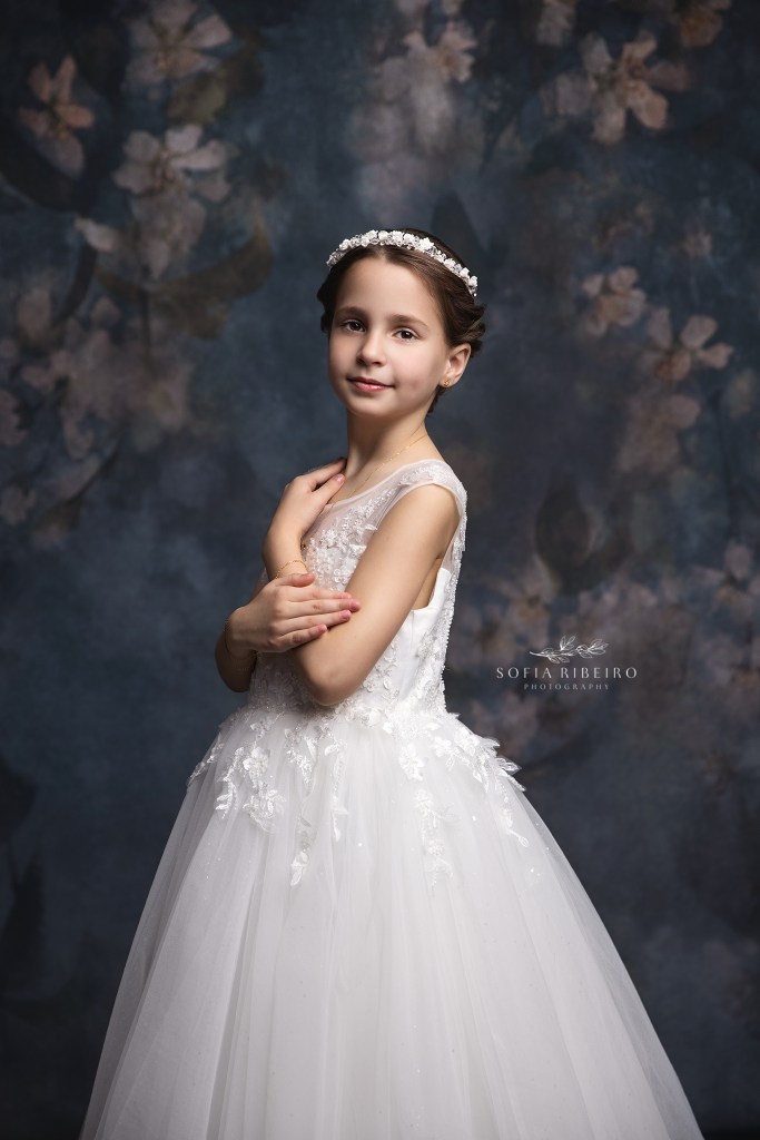 a serene, sophisticated portrait of a little girl in her communion dress in westfield nj
