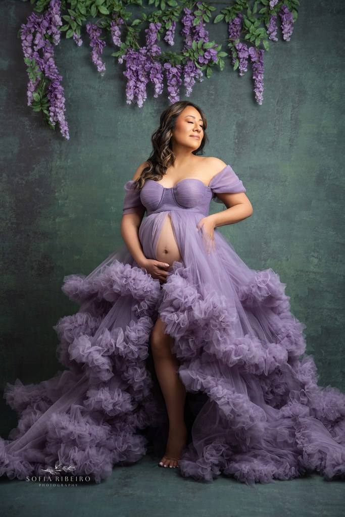 englewood nj maternity photographer creates a portrait in gorgeous teal and purple tones for mom to be