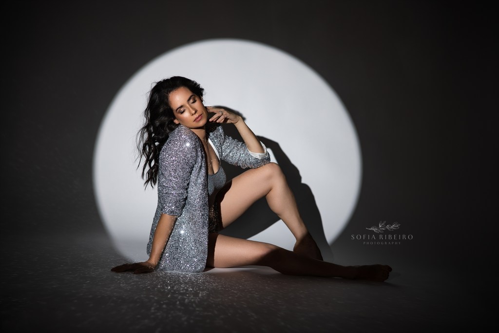 strike a pose for birthday portraits with a nj portrait photographer in simple chic outfits and creative lighting