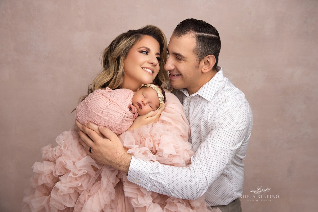 holmdel nj newborn photographer captures parents first portraits with their baby daughter