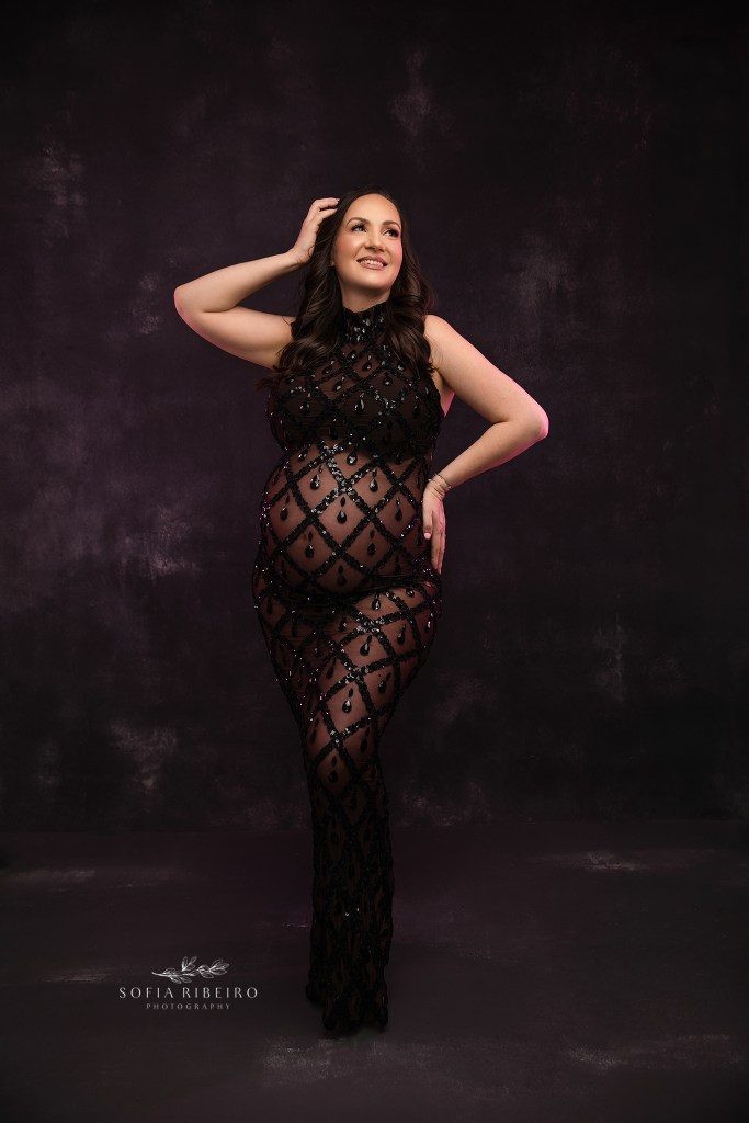 Sexy and powerful maternity portrait for mom to be in black styling at a Budd Lake NJ photography studio.