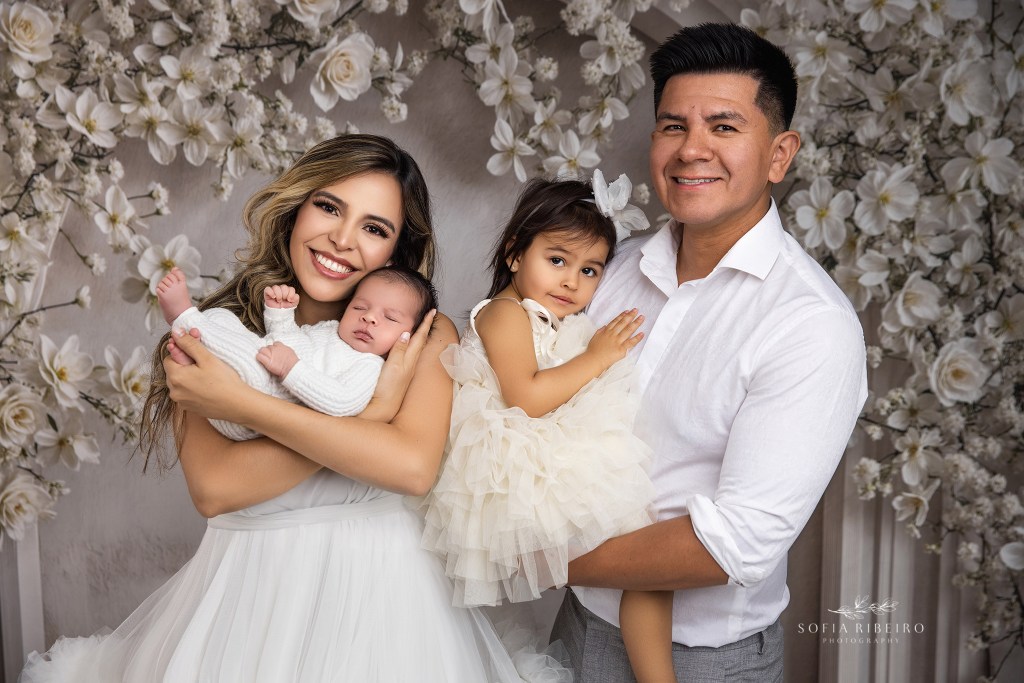 family-centered Essex County NJ newborn photography session with in white tones