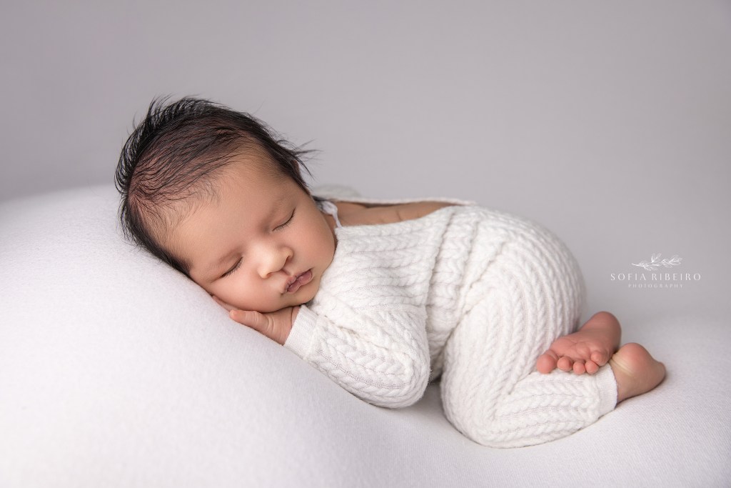 Essex County NJ newborn photography highlighting a baby boy’s first portraits in timeless style.