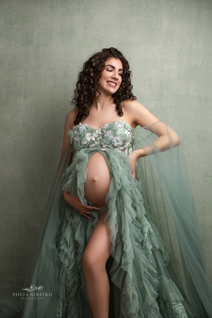 philadelphia pa maternity photographer captures an elegant portrait in shades of mint green for mom to be