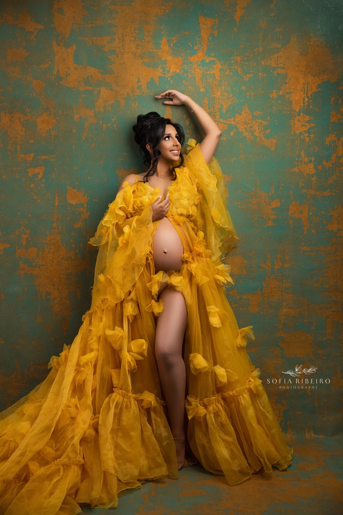 Pregnant mom in a flowing yellow dress photographed by Princeton NJ maternity photographer.