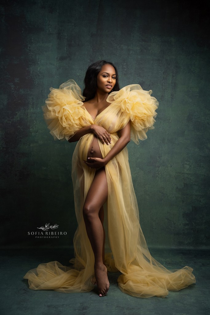 a yellow tulle gown enhances moms beauty for a portrait with a morris plains nj maternity photographer