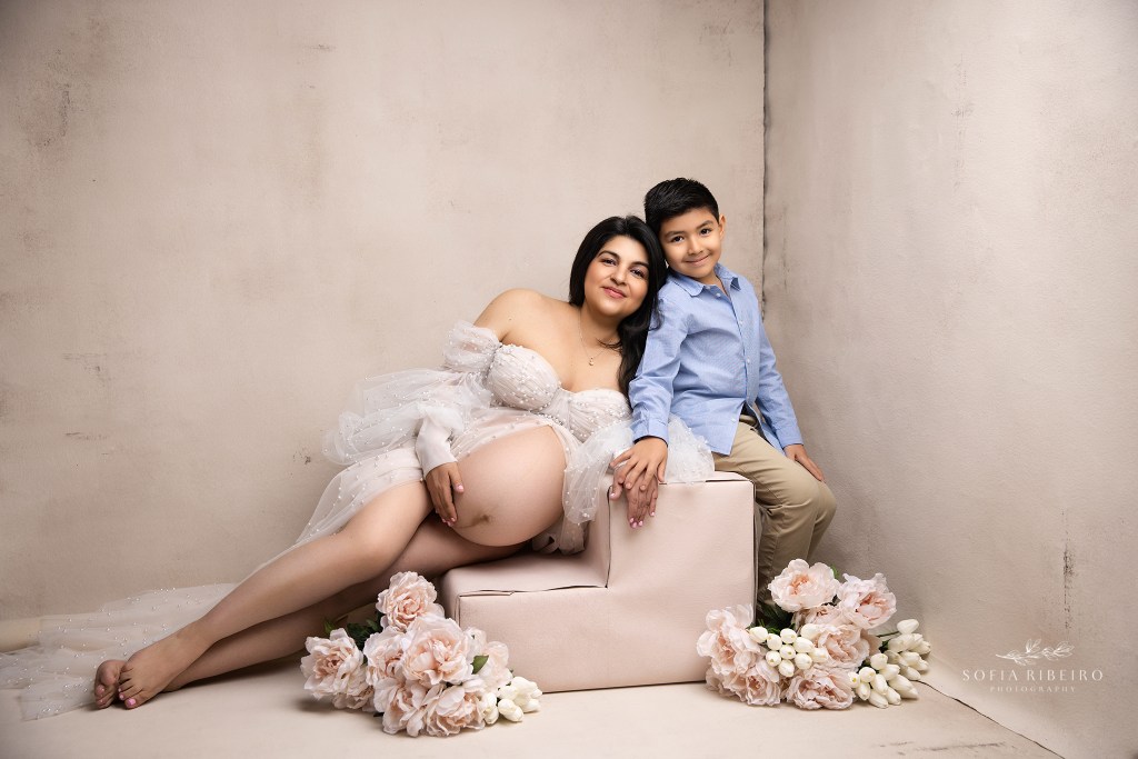 mom to be and oldest son share a sweet portrait together during a maternity photo session in nj