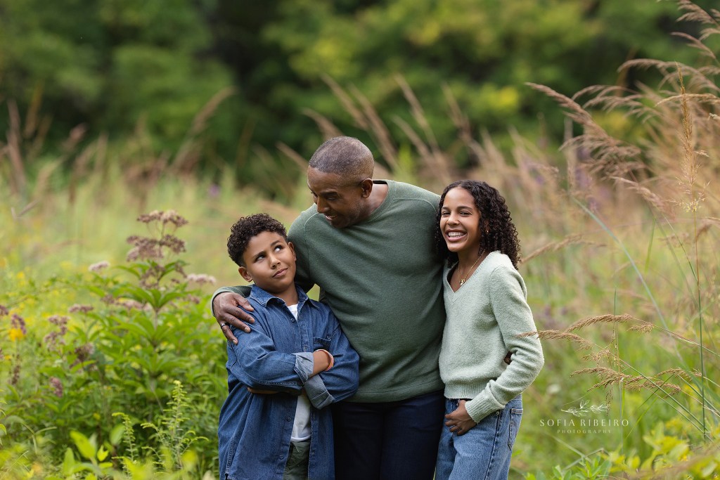 dad shares a silly moment with his kids, during a photo session with a cranford nj family photographer