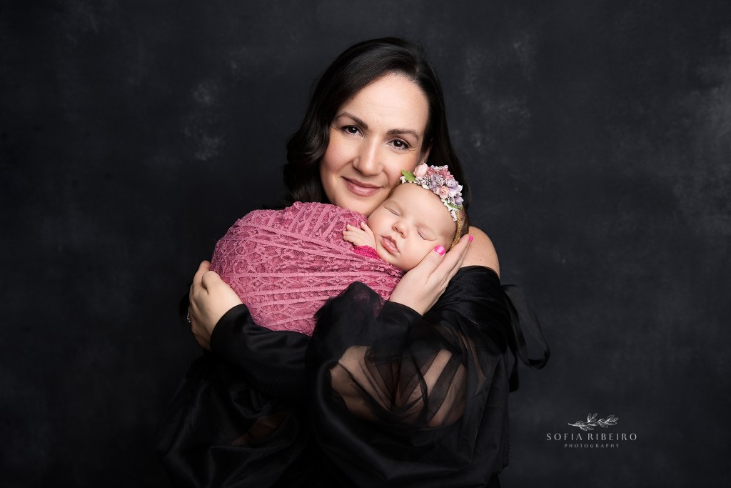 mom holds her baby