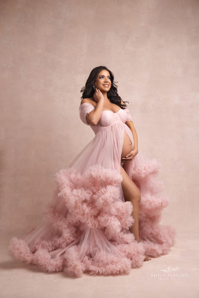 cedar grove nj maternity photographer provides wardrobe for expectant moms, like the pink gown featured in this maternity opse