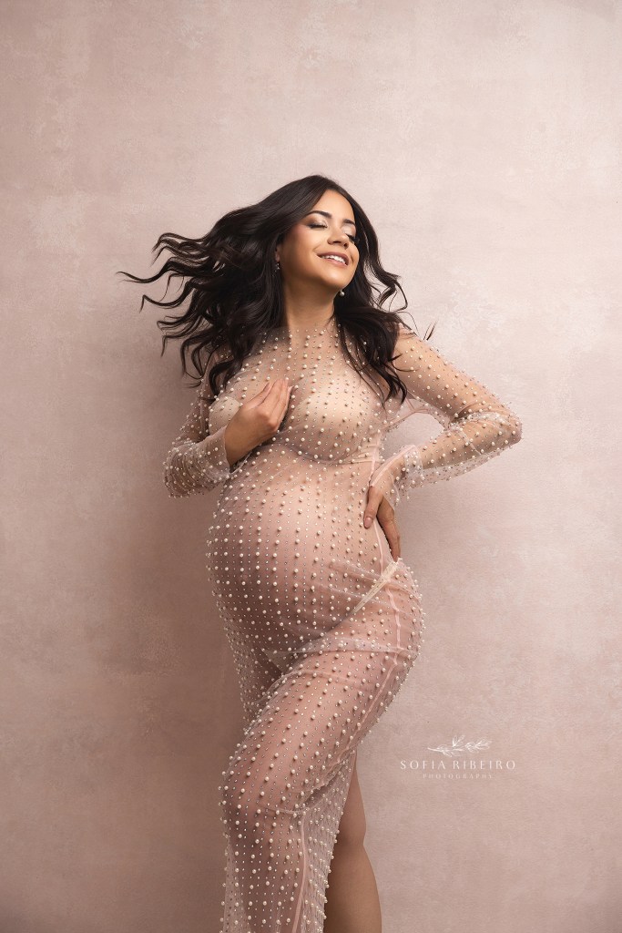 cedar grove nj maternity photographer captures mom to be in motion in a sheer pearl dress